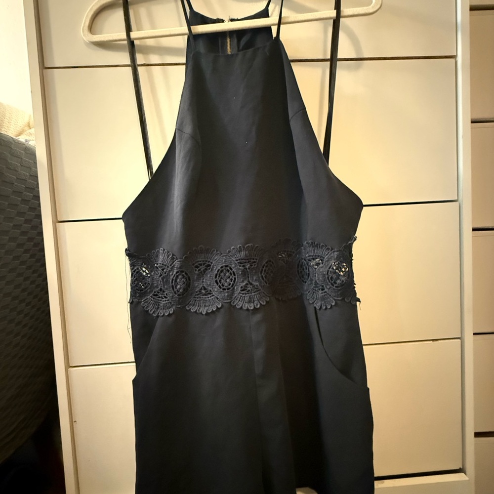 Elegant Black Halter Romper with Lace Detail